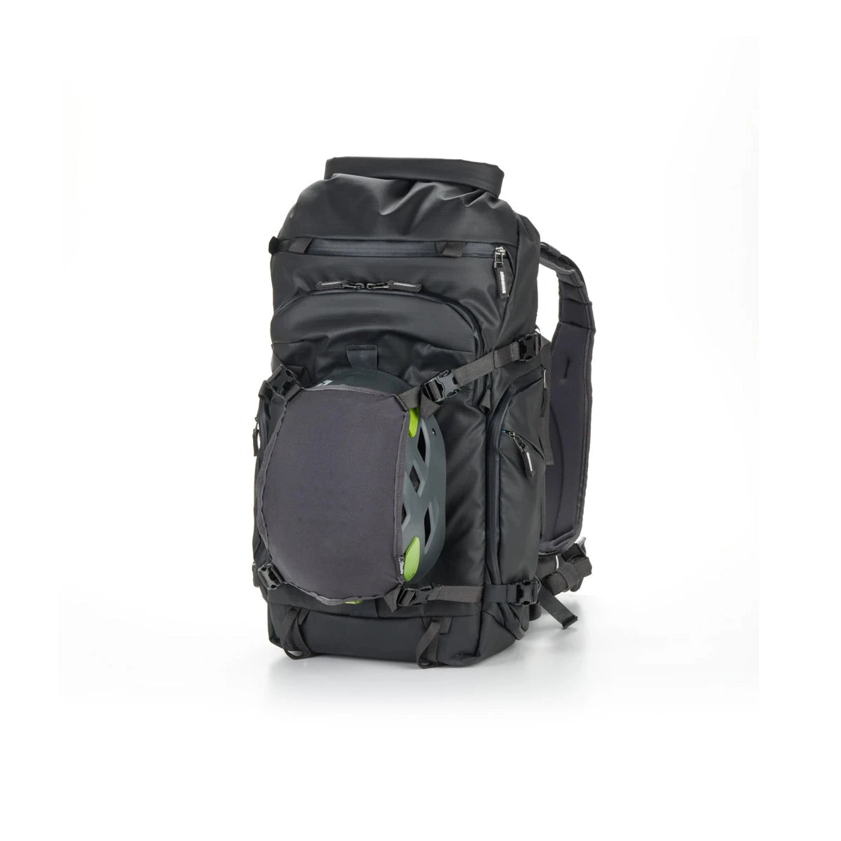 A black roll-top backpack with a front-mounted dark gray ski bag holding a green and black ski, shown on a clean white background.