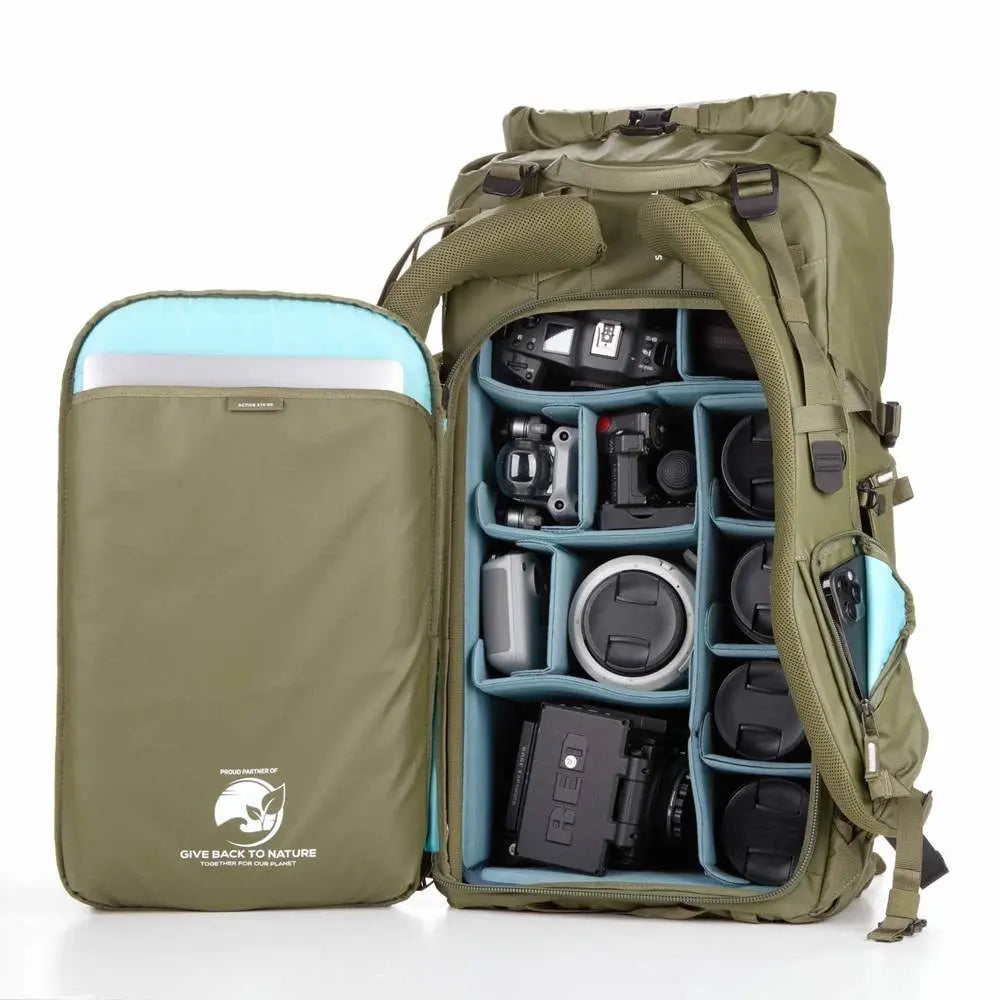 Green camera backpack with compartments for camera equipment on a white background