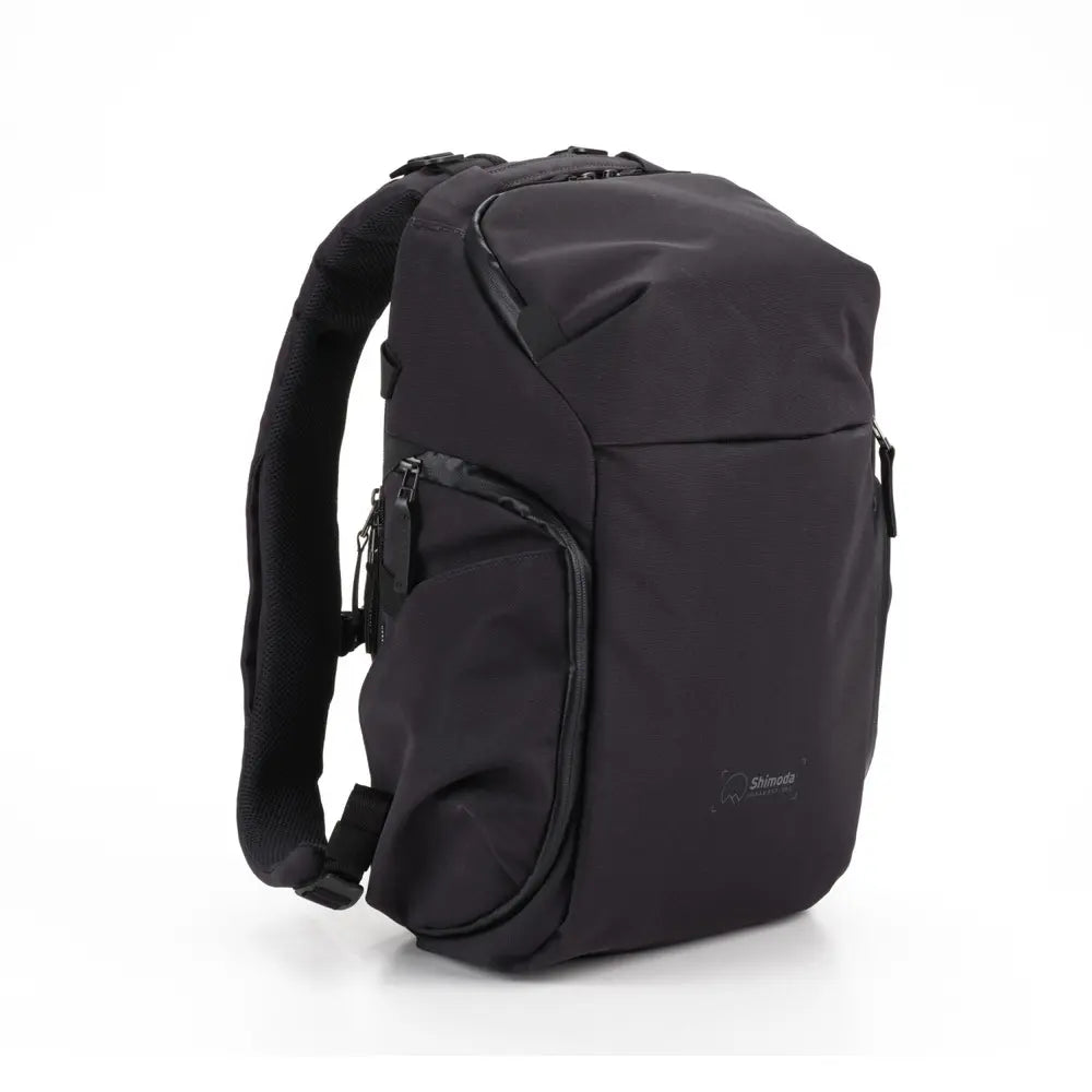 Black backpack on a white background