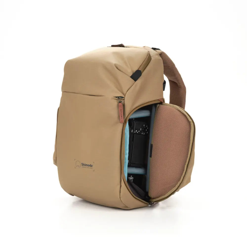 Beige backpack with a visible brand logo on a white background