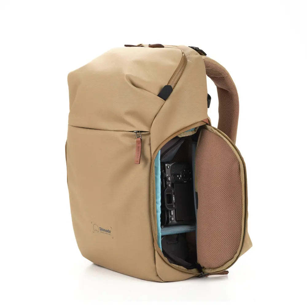 Beige backpack with open front compartment on a white background