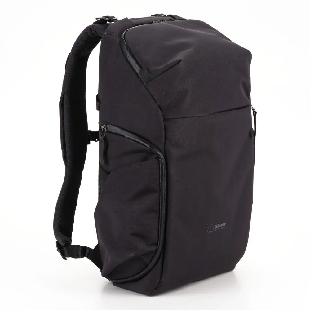 Black backpack on a white background