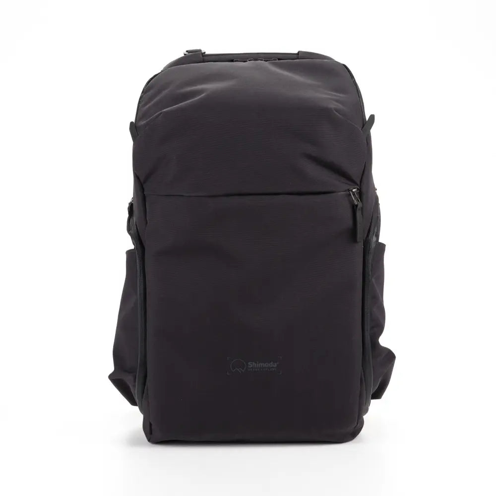 Black backpack with a brand logo on a white background