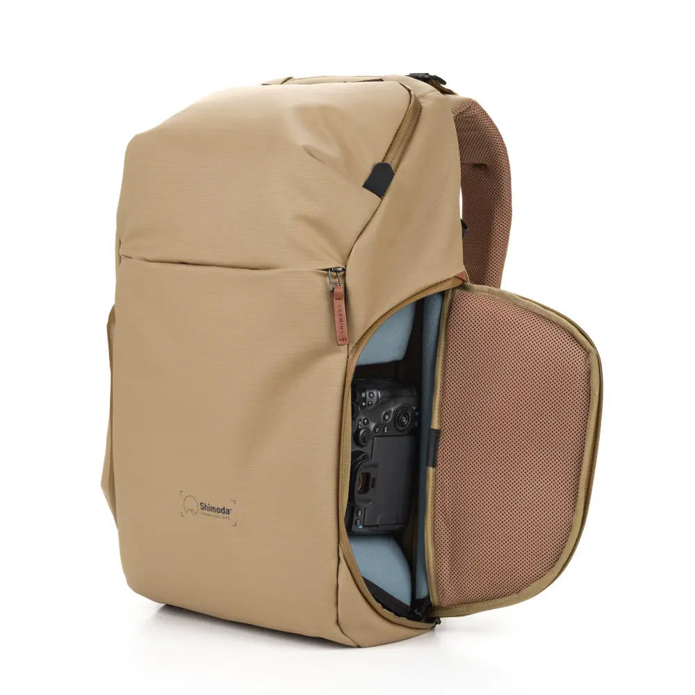 Beige backpack with a visible brand logo on a white background