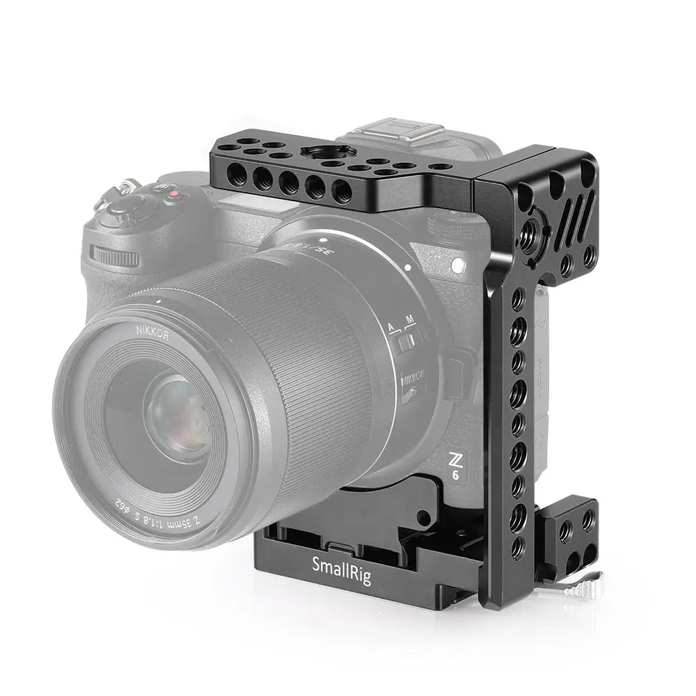 Camera with a metal cage attached on a white background