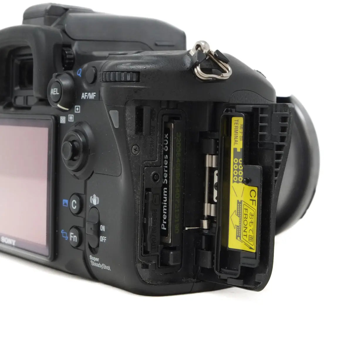 Sony A700 + VG-C70AM battery grip + Tamron 20-40mm lens (SH43176) side with battery door open