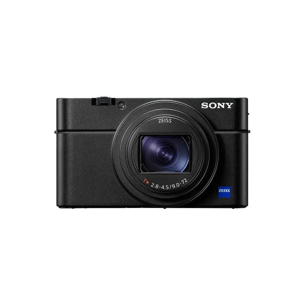 Sony compact digital camera in black with a large Zeiss lens, shown from the front against a light gray background.