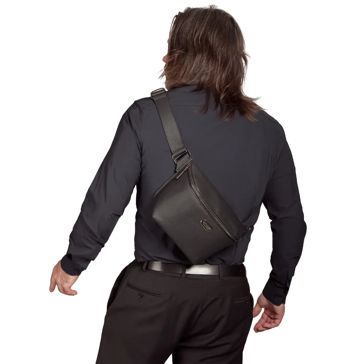 Person wearing a black shoulder bag on a white background