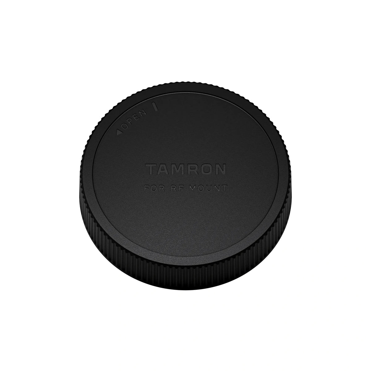 A black Tamron lens cap for RF mount, shown from a top-down view on a solid white background.