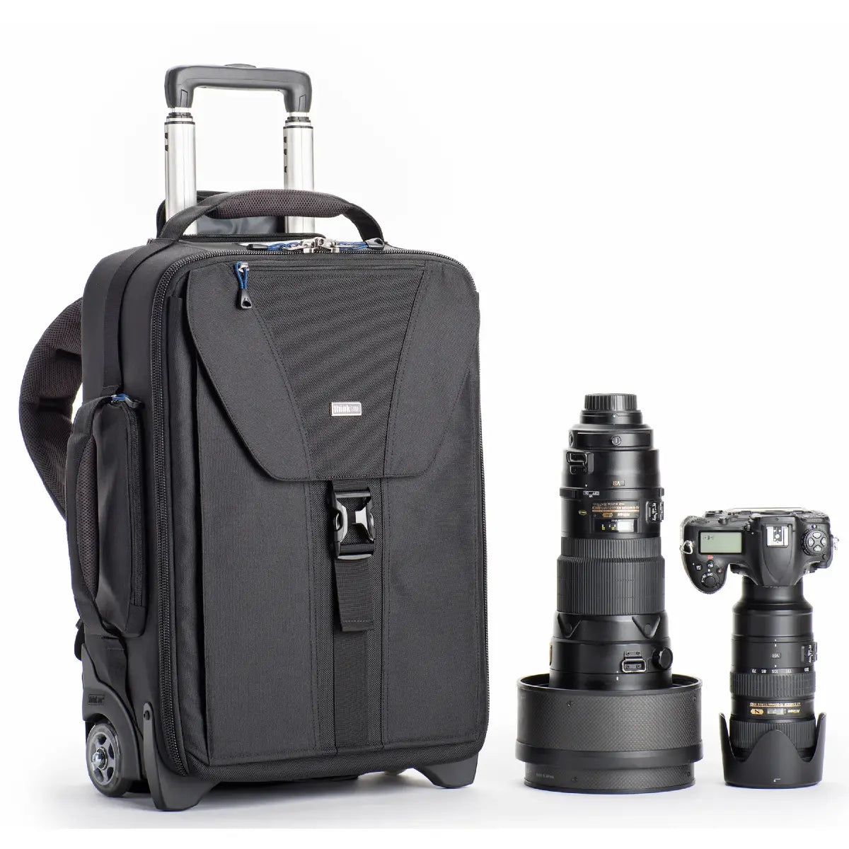 Black suitcase with camera and lenses on a white background