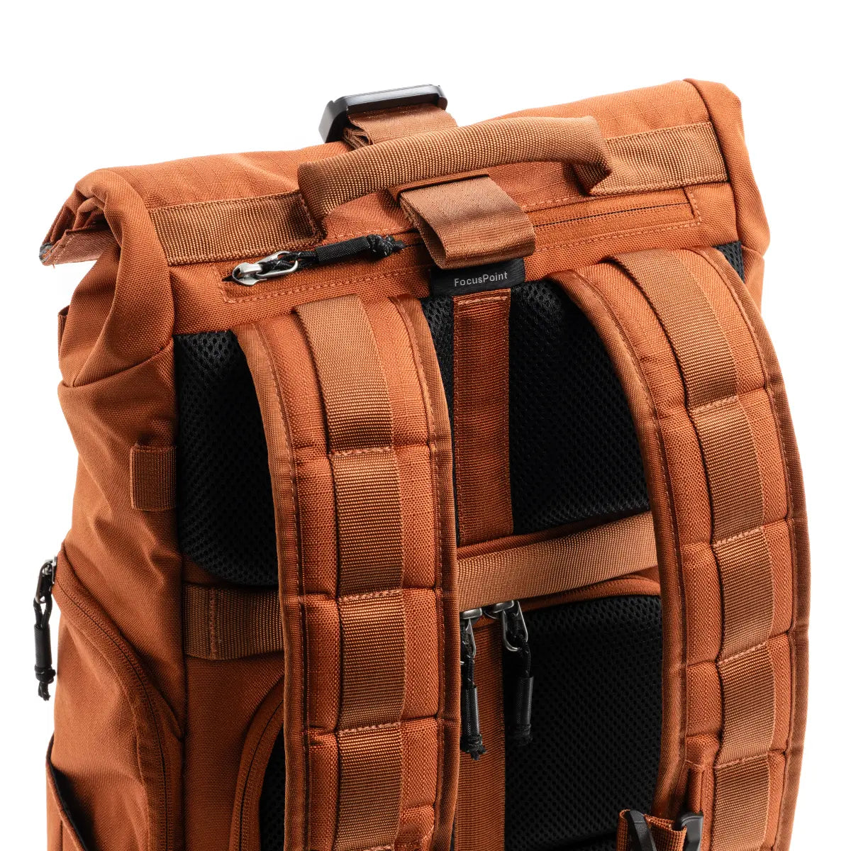 Brown backpack with multiple compartments and zippers on a white background