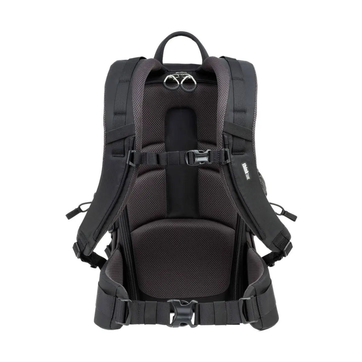 Black backpack with multiple straps and buckles on a white background