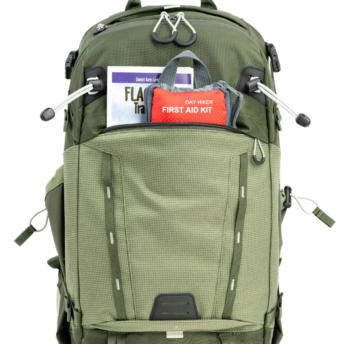 Green backpack with a first aid kit labeled 'Day Hiker First Aid Kit' on a white background