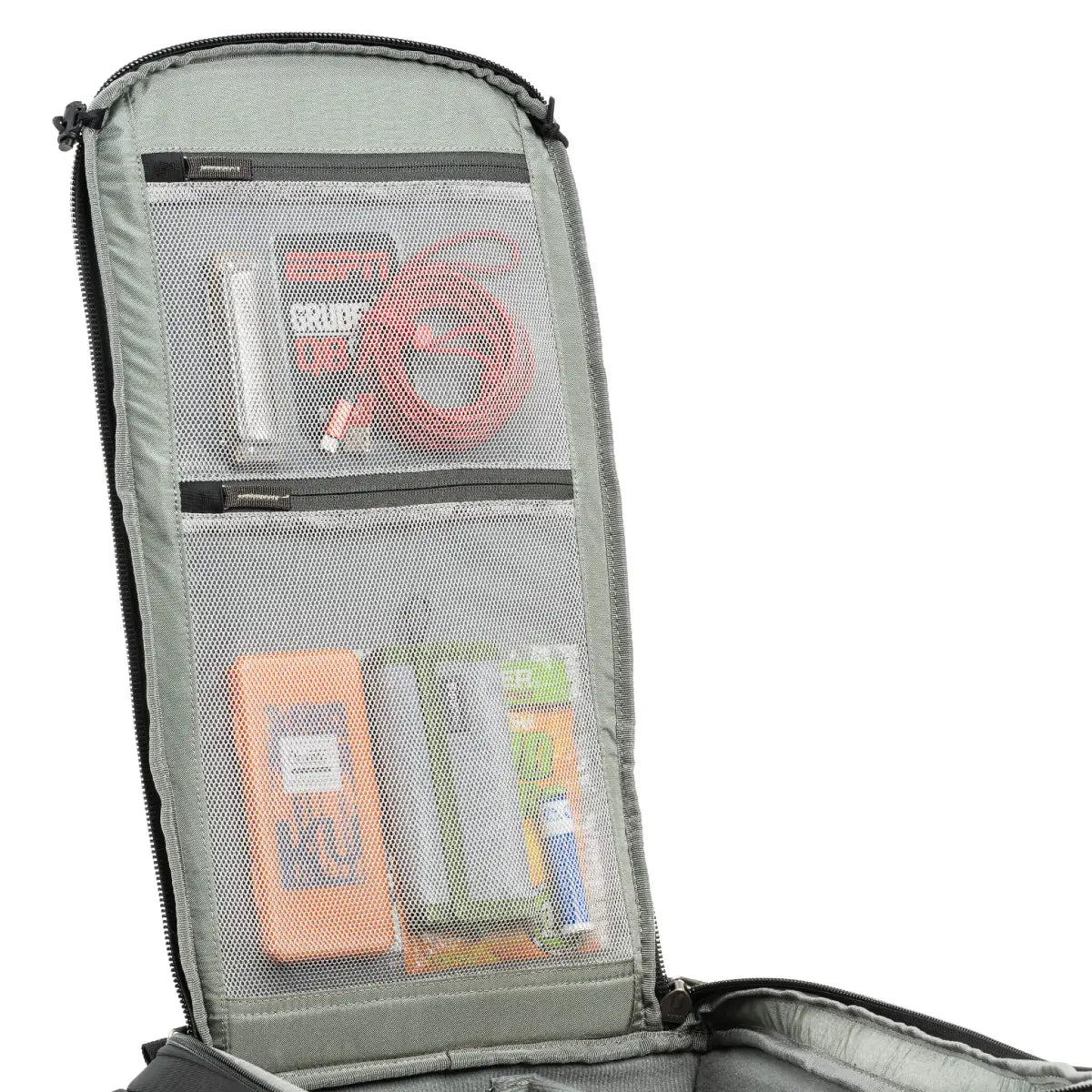 Gray backpack with open compartment showing electronic devices and cables on a white background