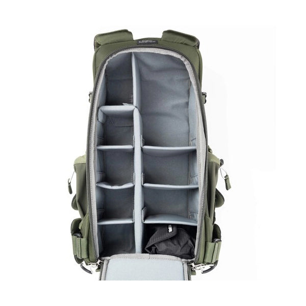 Green backpack with compartmentalized interior on a white background