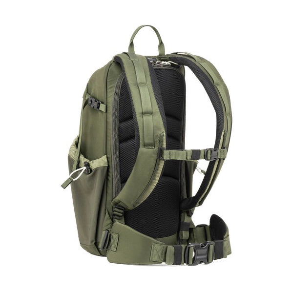 Green backpack with black interior on a white background
