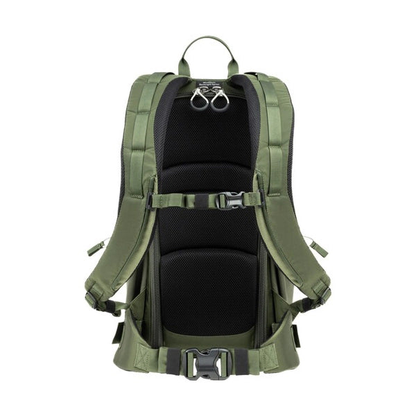Green backpack with black interior on a white background