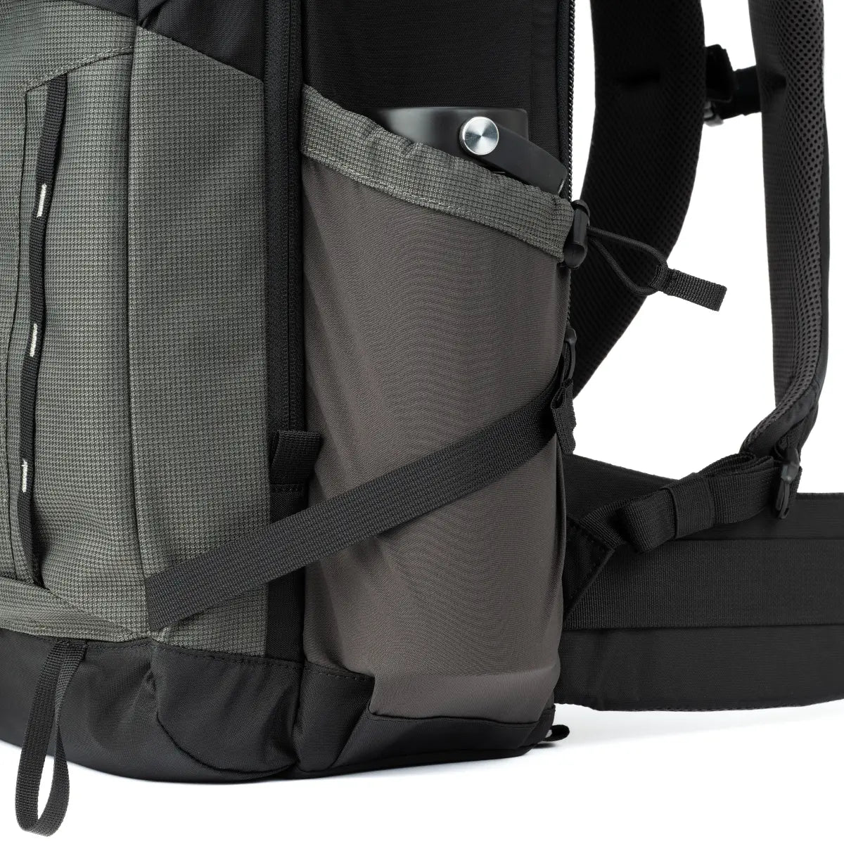 Close-up of a black and gray backpack with straps on a white background