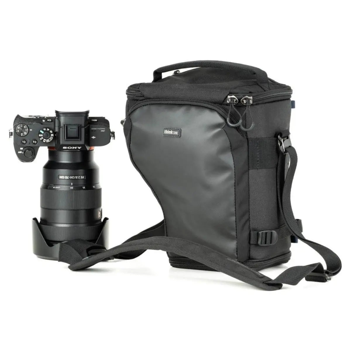 Black camera backpack with a camera on a white background