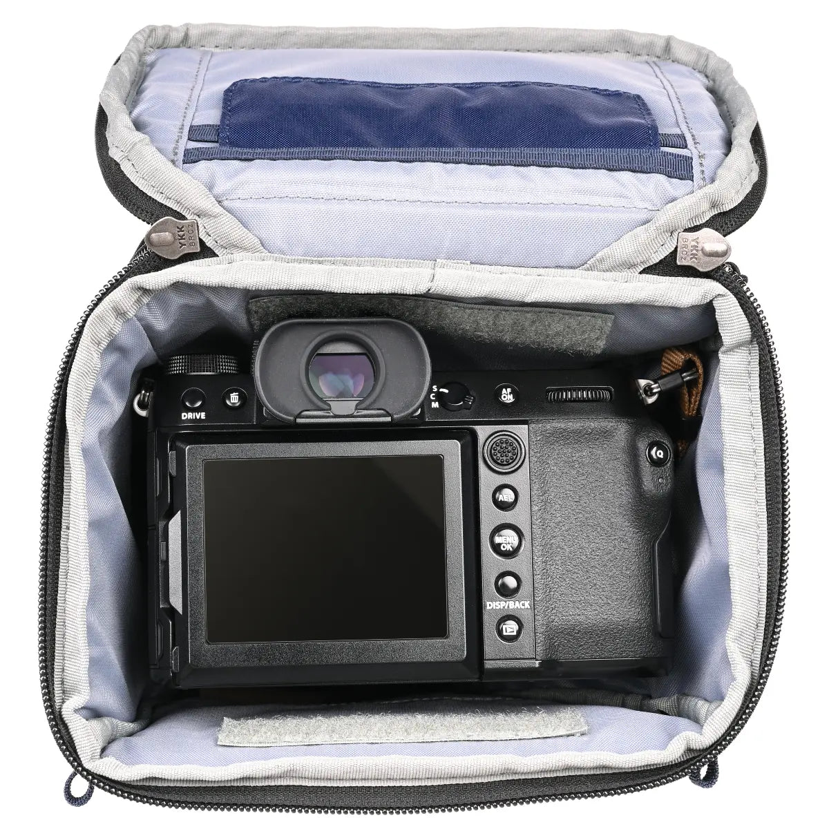 Camera inside a carrying case on a white background