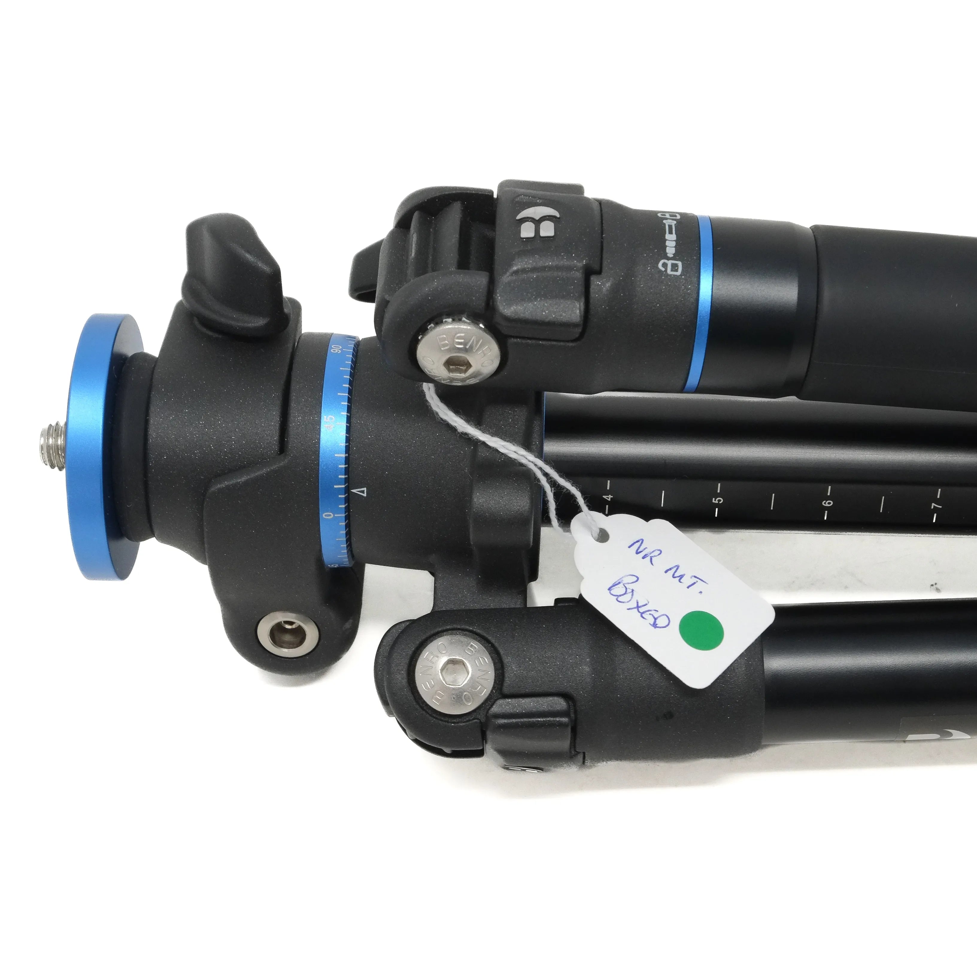Camera tripod with a focus on the adjustable head and legs on a white background