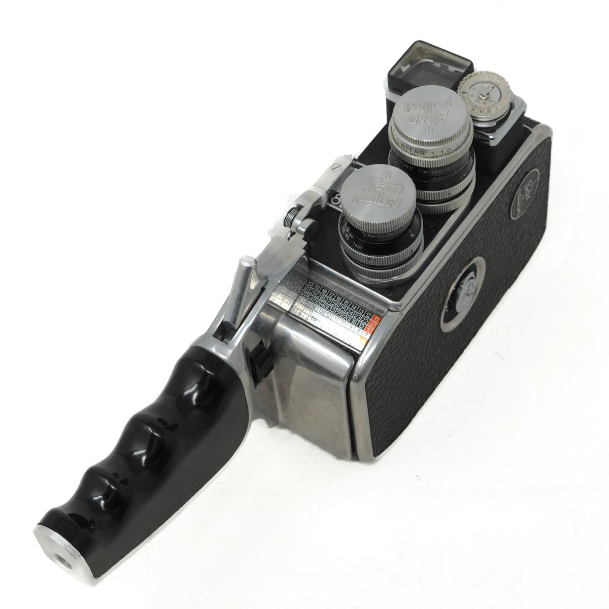 Vintage camera with multiple lenses on a white background