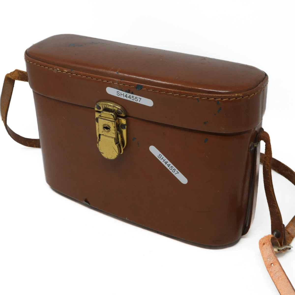 Brown leather bag with gold clasp on a white background