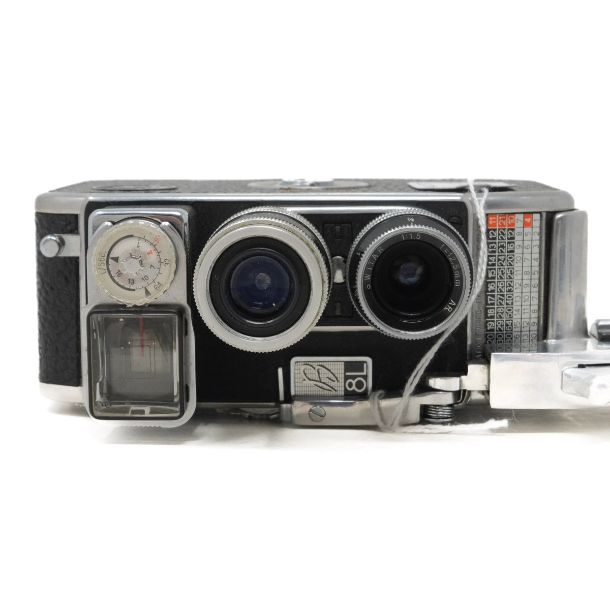 Vintage camera with dual lens on a white background