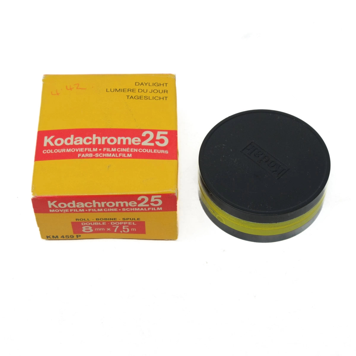 Kodachrome 25 film canister and packaging on a white background