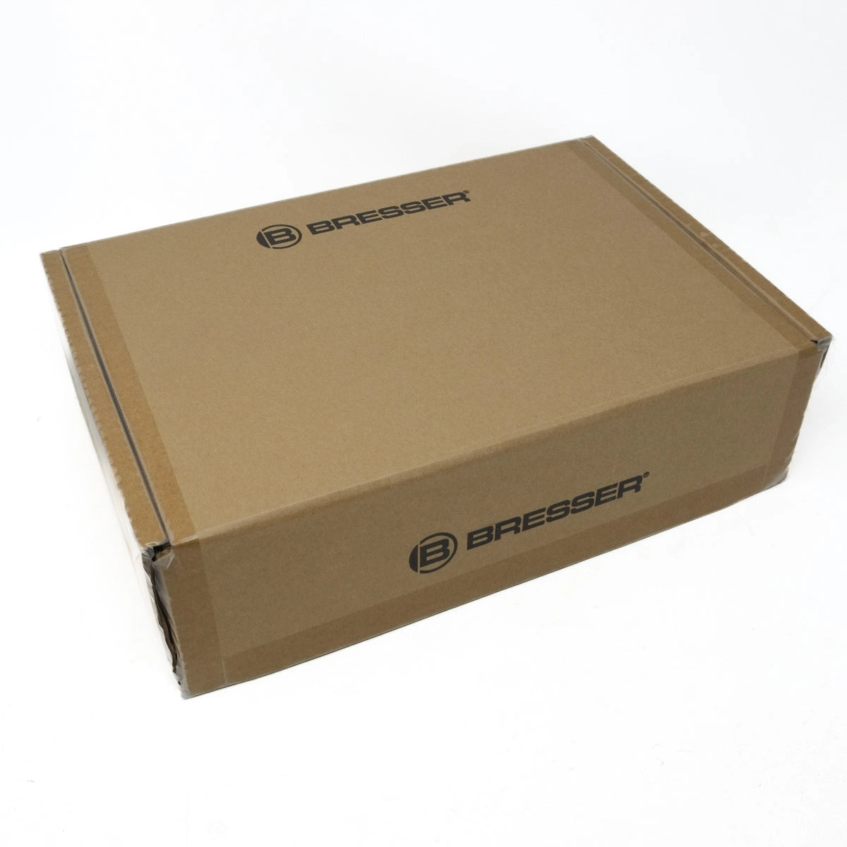 Brown cardboard box with Bresser logo on a white background