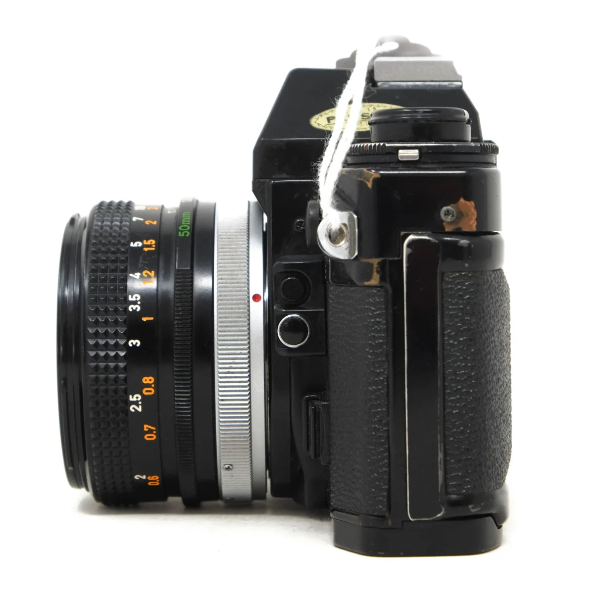 Used canon A-1 Film camera with 50mm F1.8 - side angle 