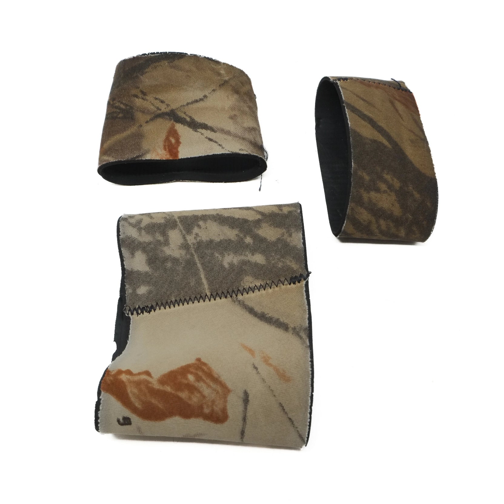 Camouflage-patterned covers on a white background