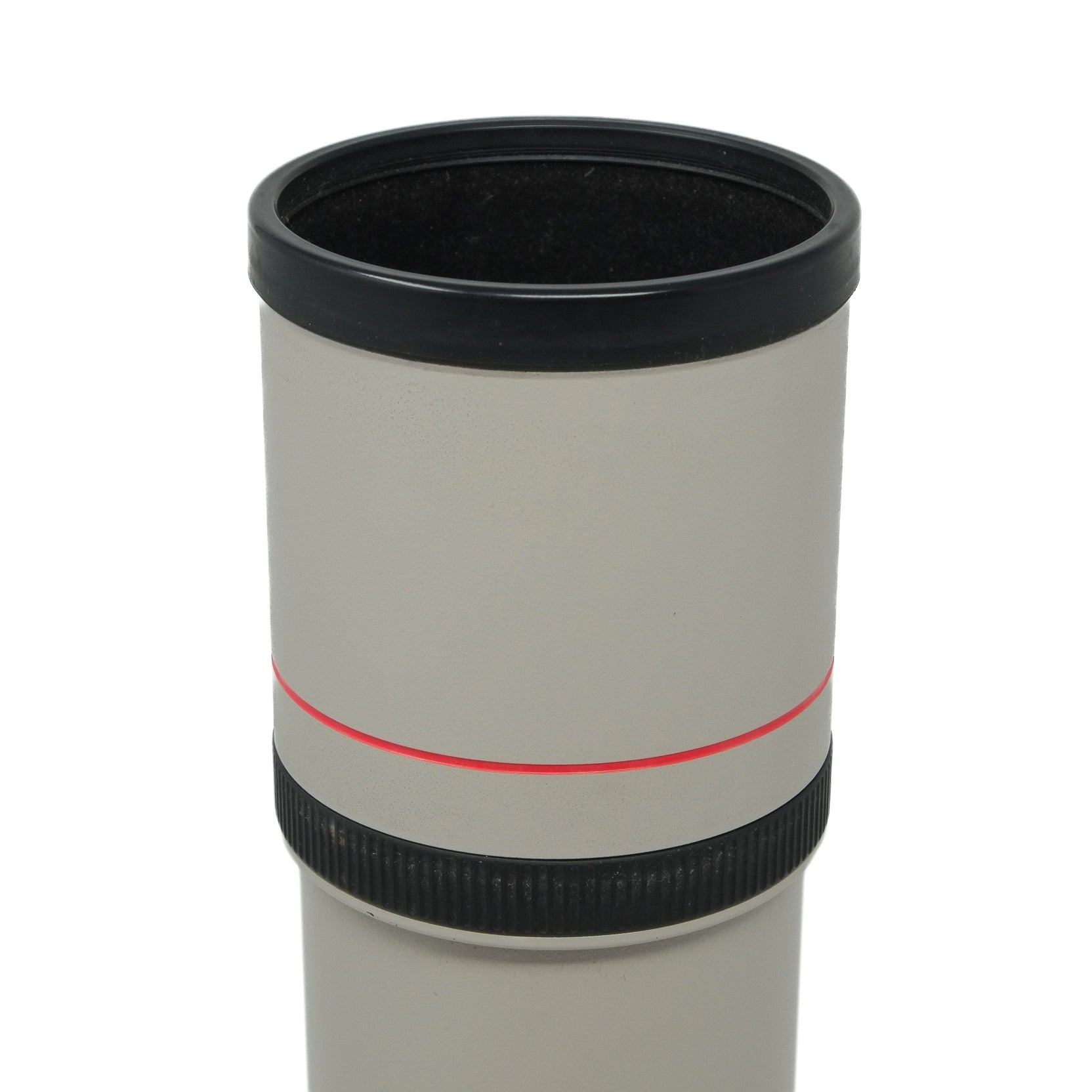 Camera lens with black and red accents on a white background