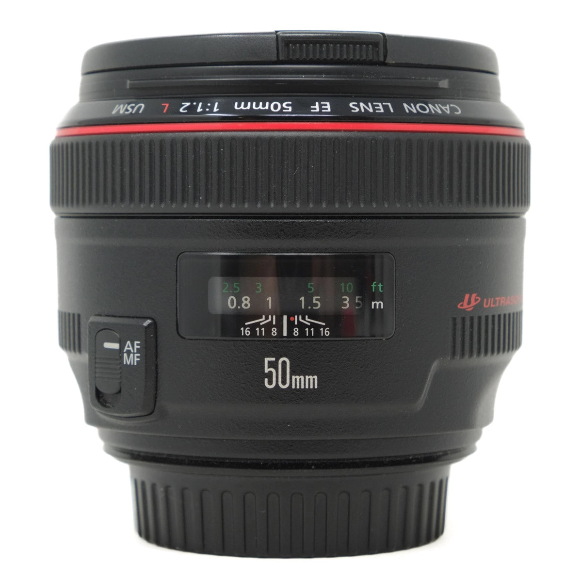 Canon camera lens with focus and aperture information on a white background