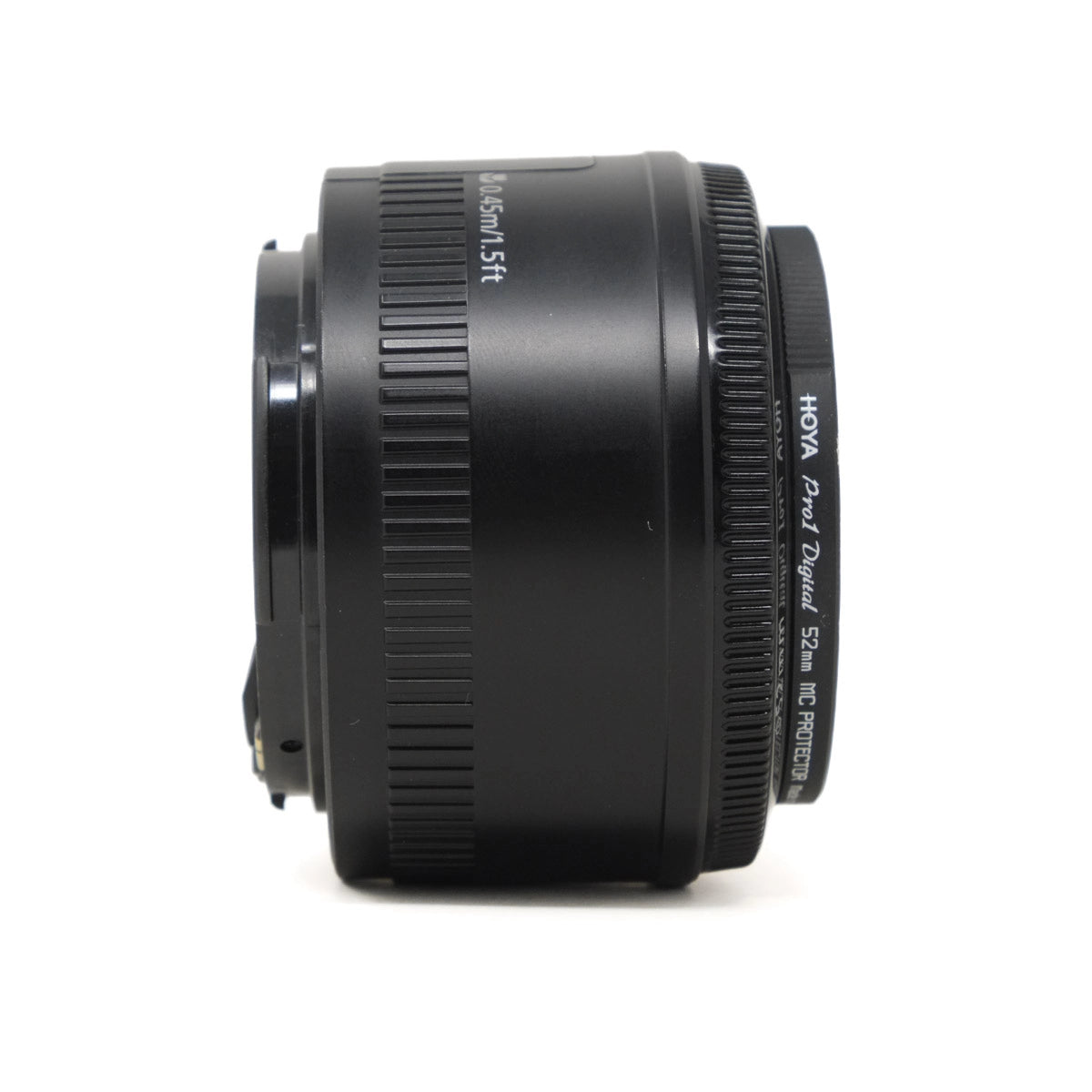 Black camera lens on a white background