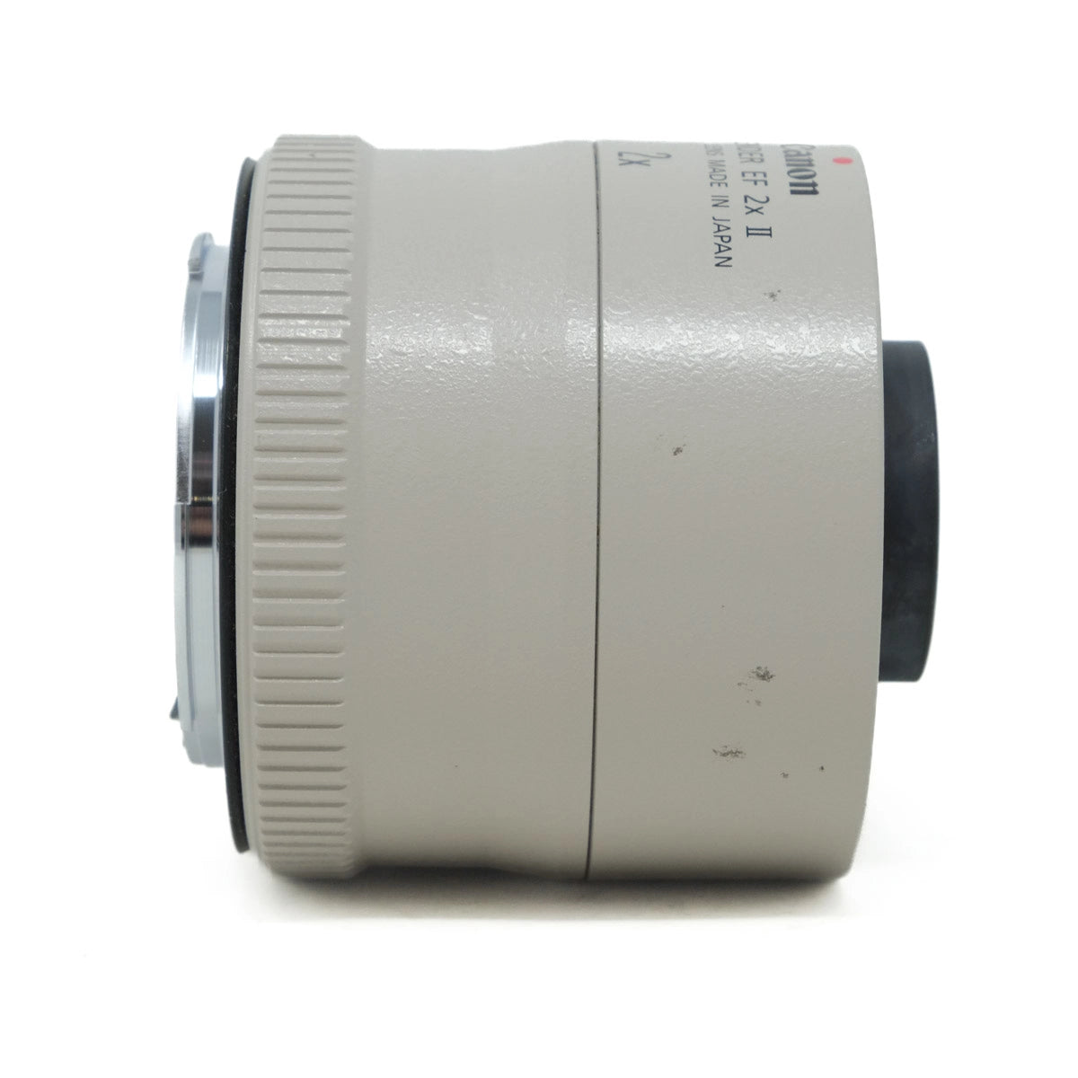 Camera lens extender on a white background