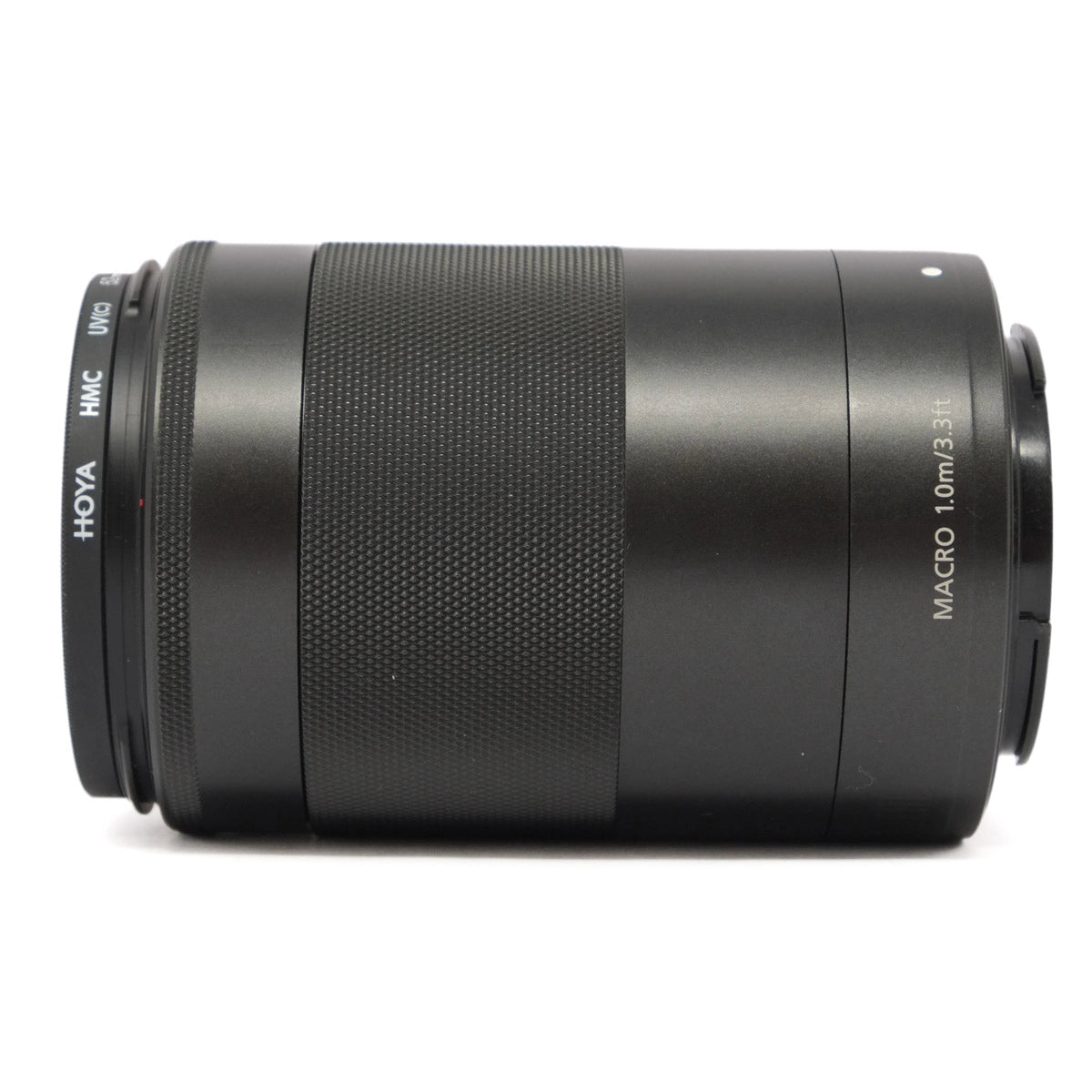 Black camera lens with 'HOYTA' filter branding on a white background