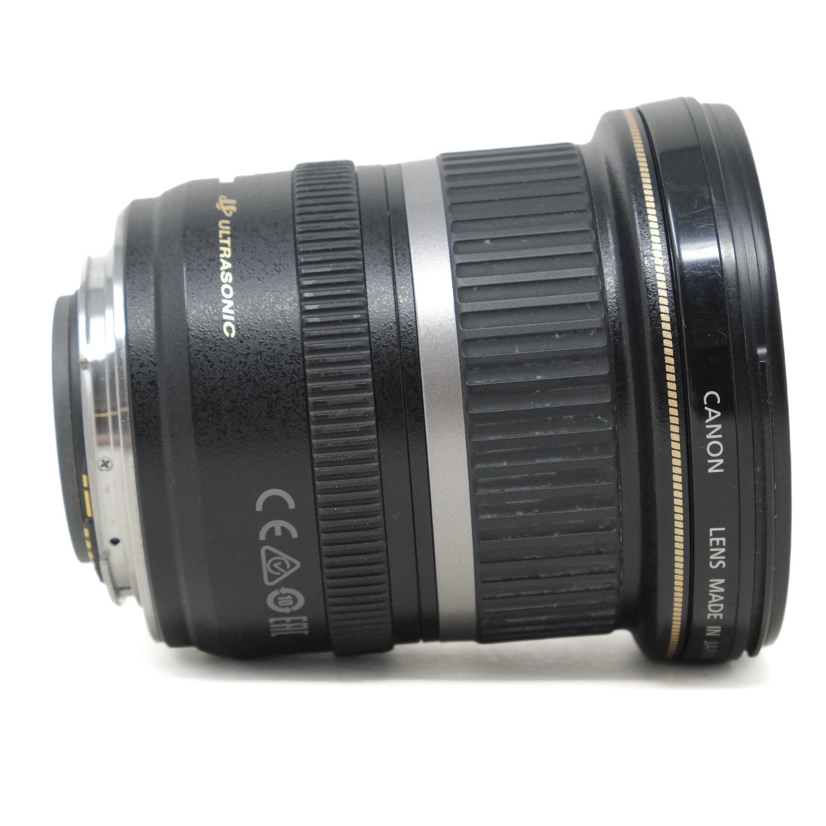 Camera lens with 'Canon' branding on a white background