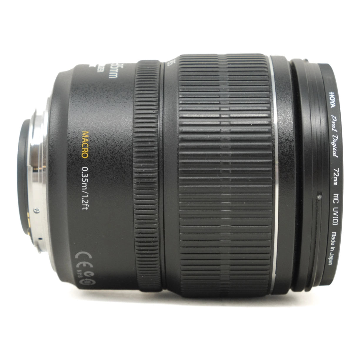 Camera lens with text and branding on a white background