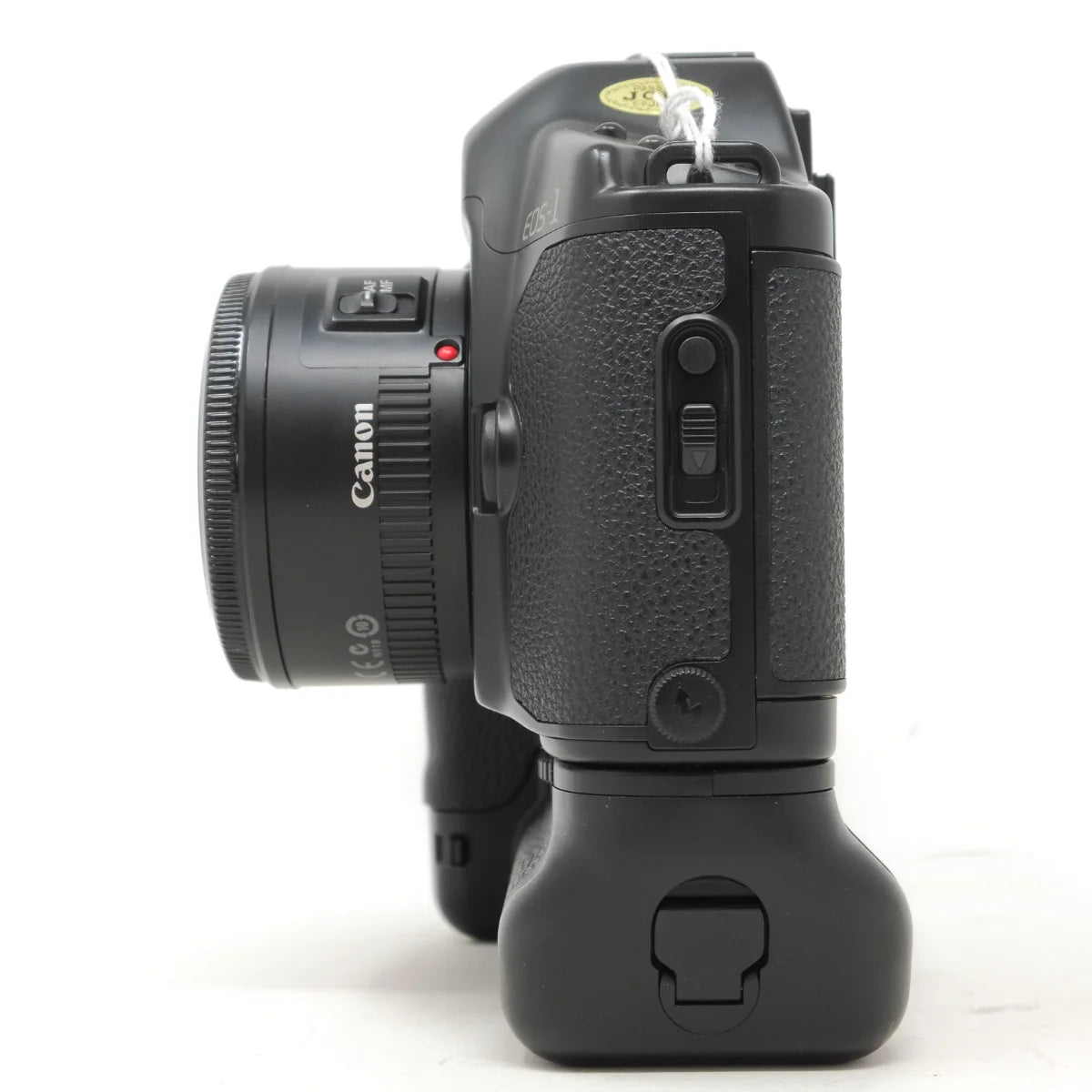 Used Canon EOS 1 Classic film camera with Booster E1 and 50mm F1.8 - side angle