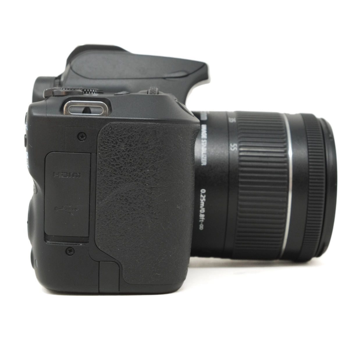 Black DSLR camera with lens on a white background