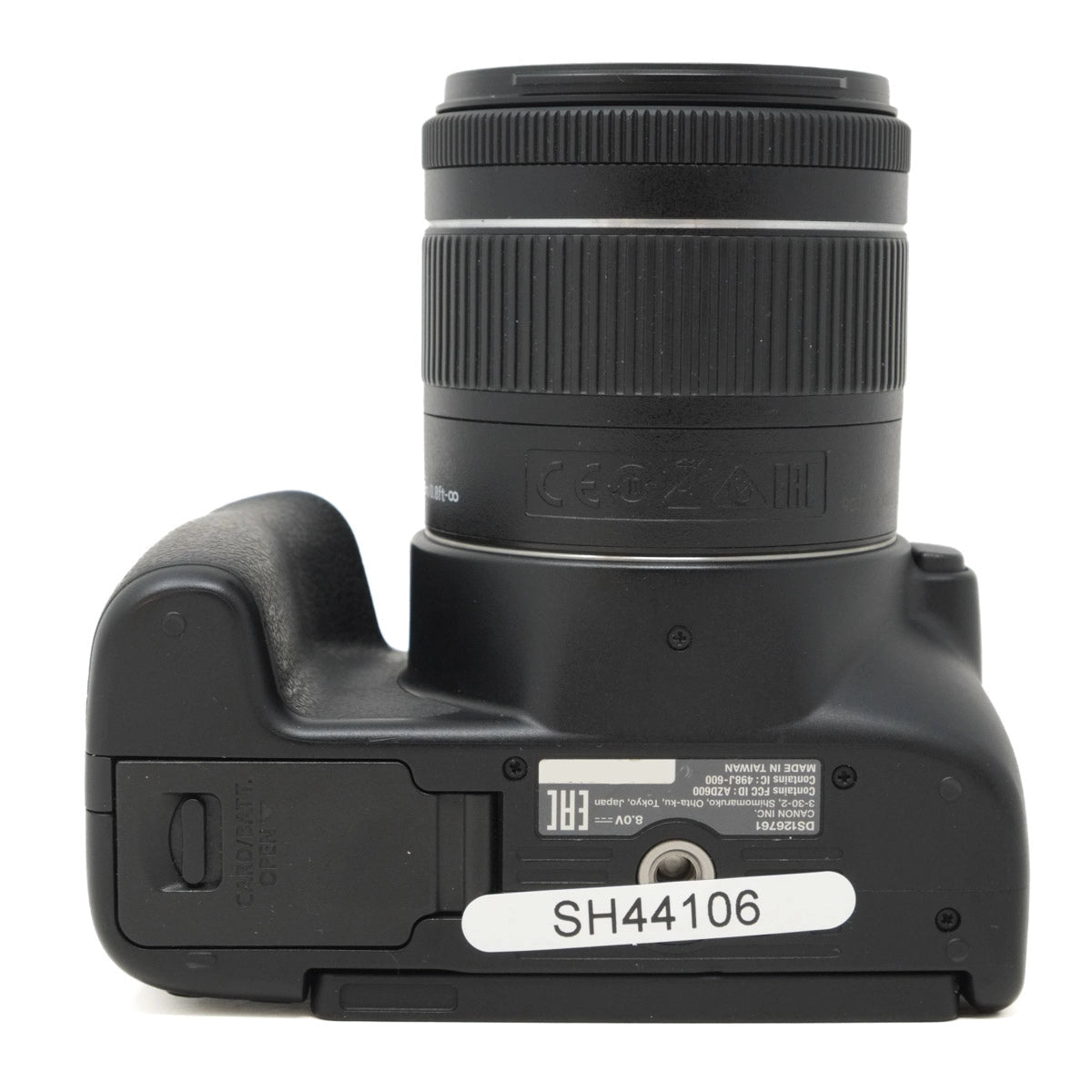 Camera body with lens on a white background