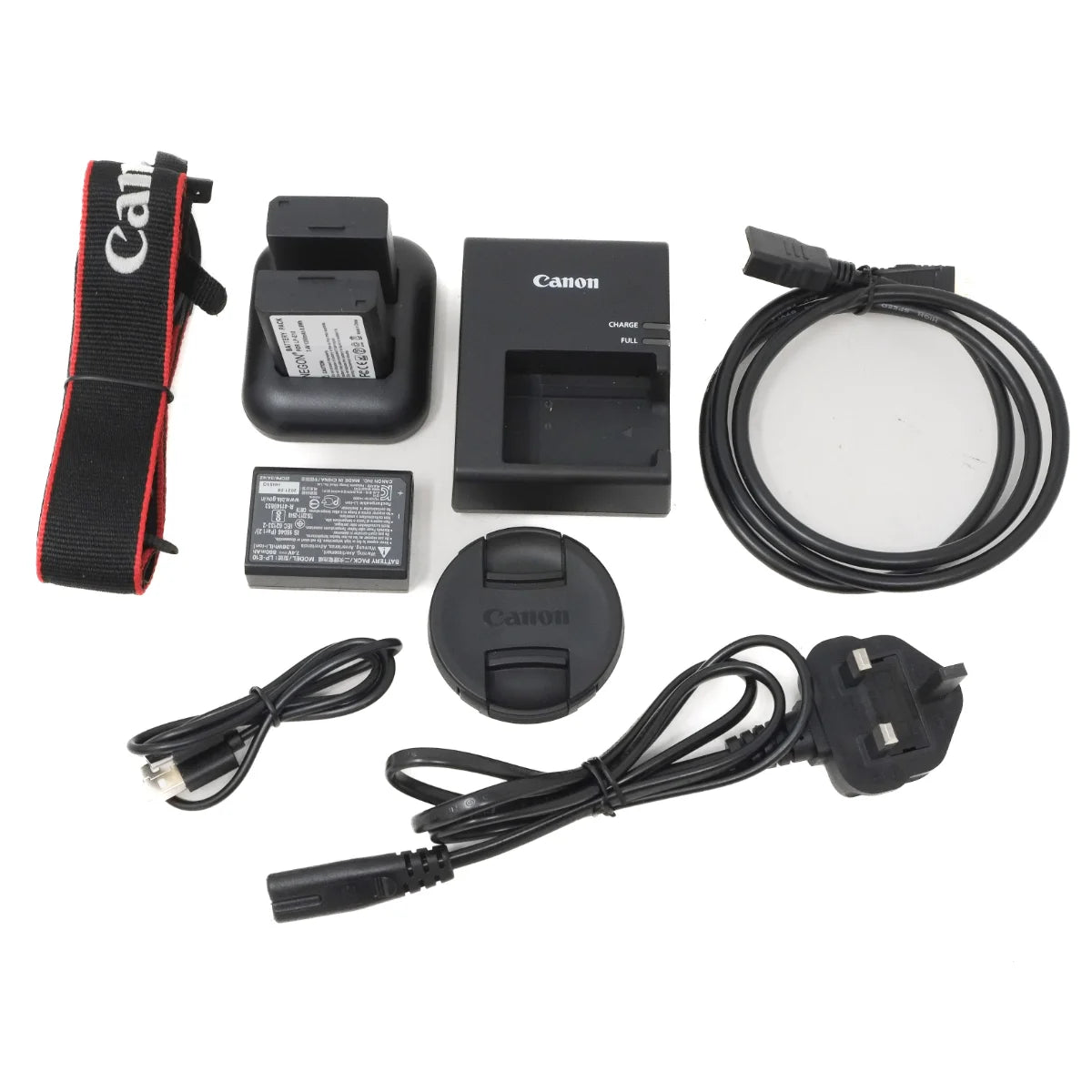 Used Canon EOS 4000D with 18-55mm III lens - strap, batteries, charger and lens cap