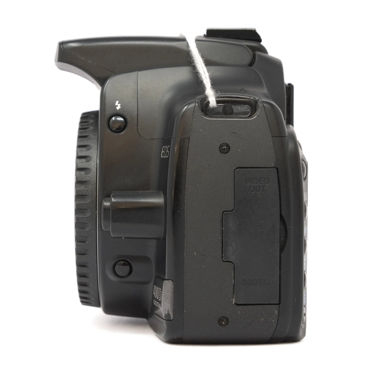 Close-up of a black camera body on a white background