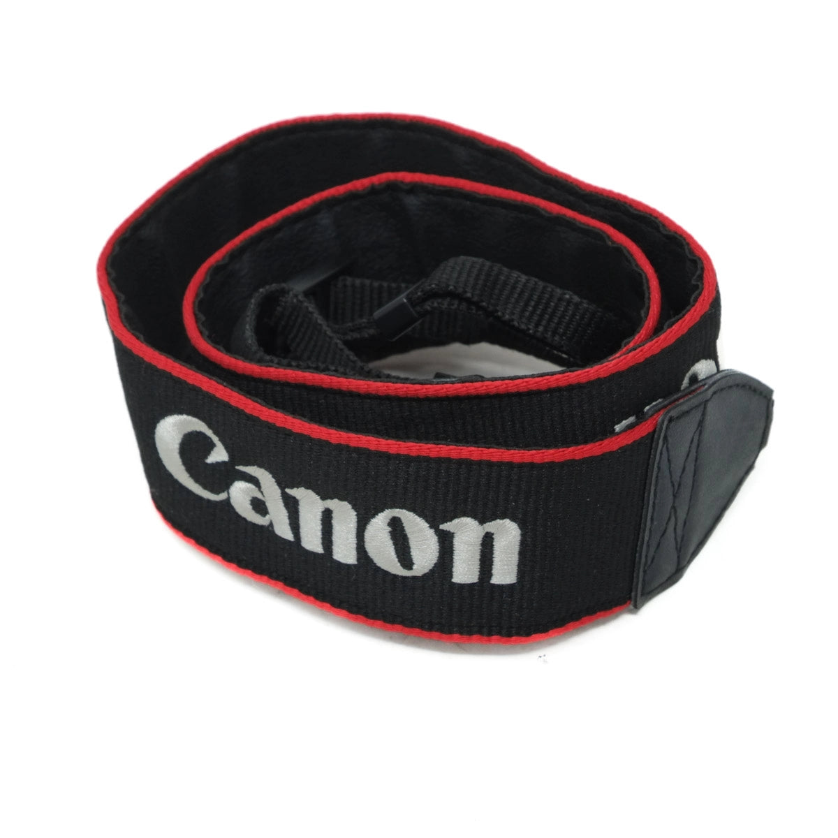 Black camera strap with red edge and 'Canon' branding on a white background