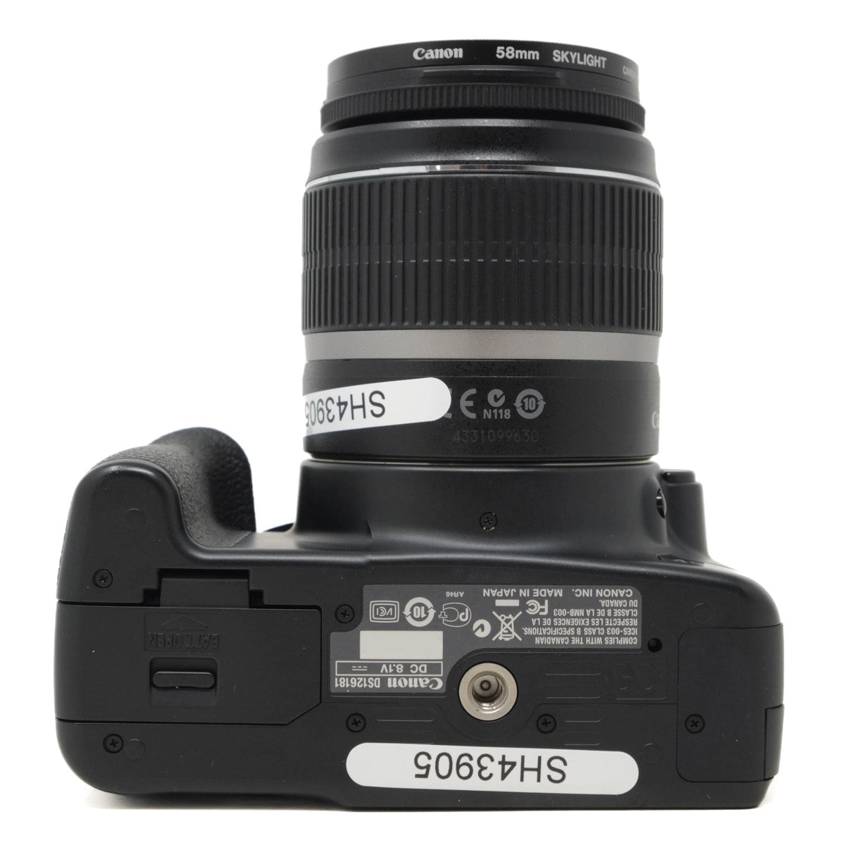 Canon camera with lens on a white background