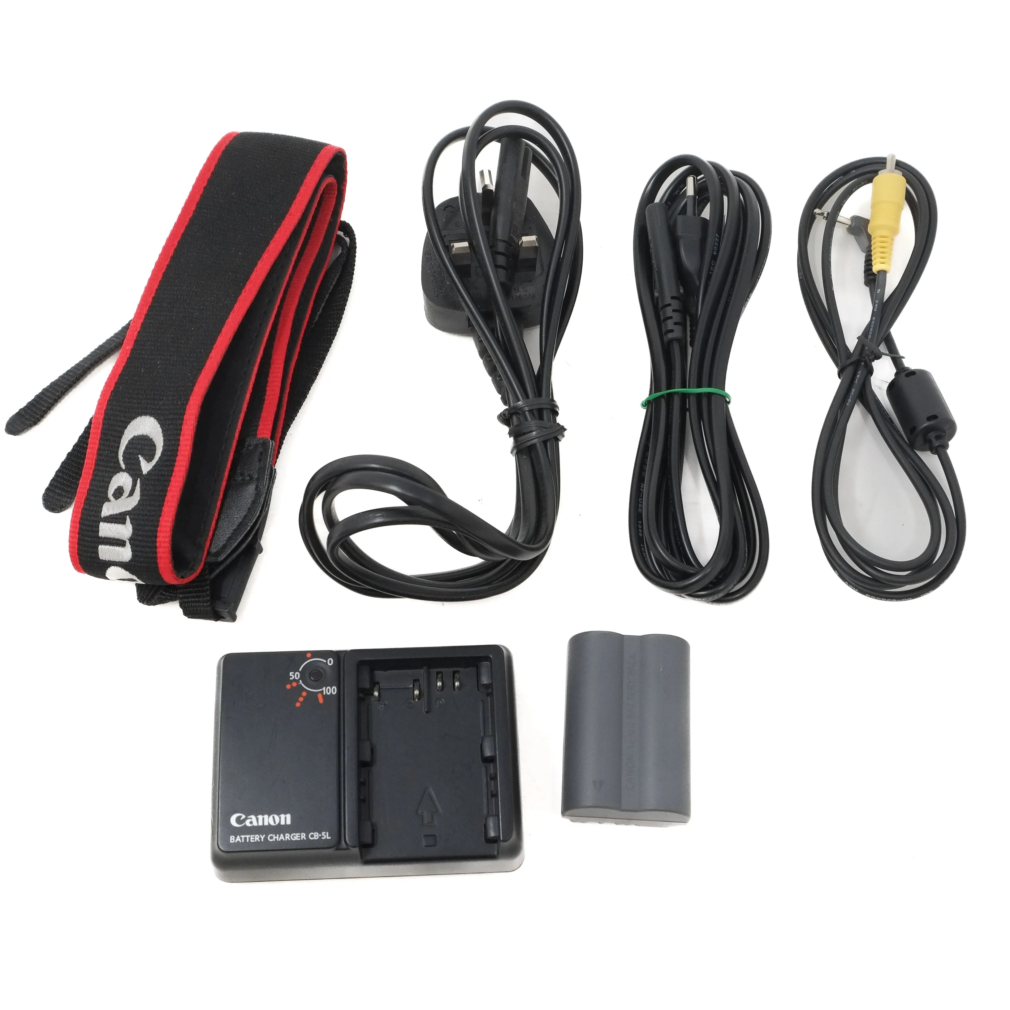 Canon camera accessory kit with strap, cables, battery, and charger on a white background