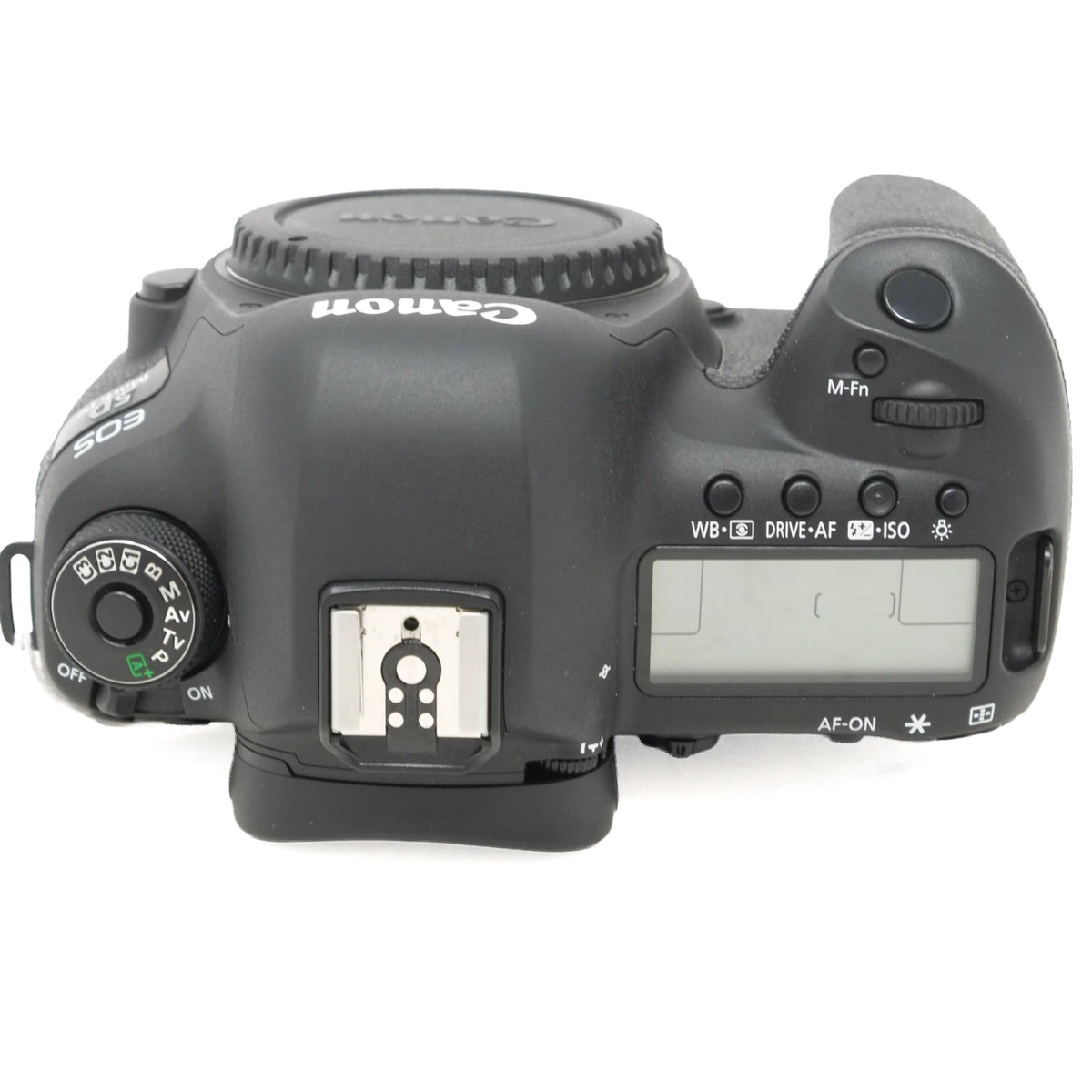 Canon EOS DSLR camera body top view, showing the control buttons, mode dial, hot shoe, and LCD screen on a white background.