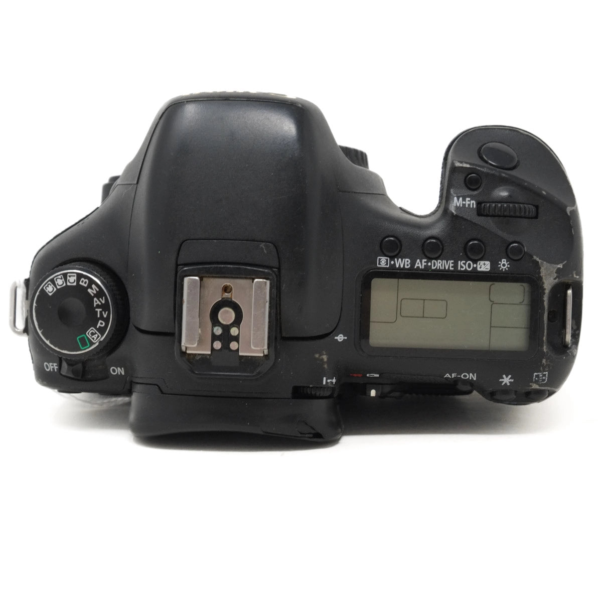 Black DSLR camera body on a white background