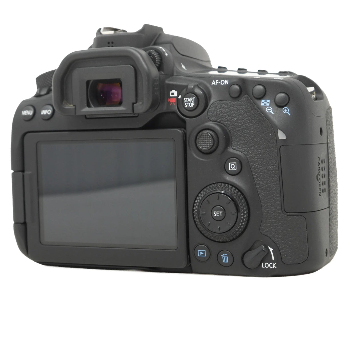 The rear view of a black DSLR camera body with a large LCD screen, showing various control buttons and dials on a solid white background.